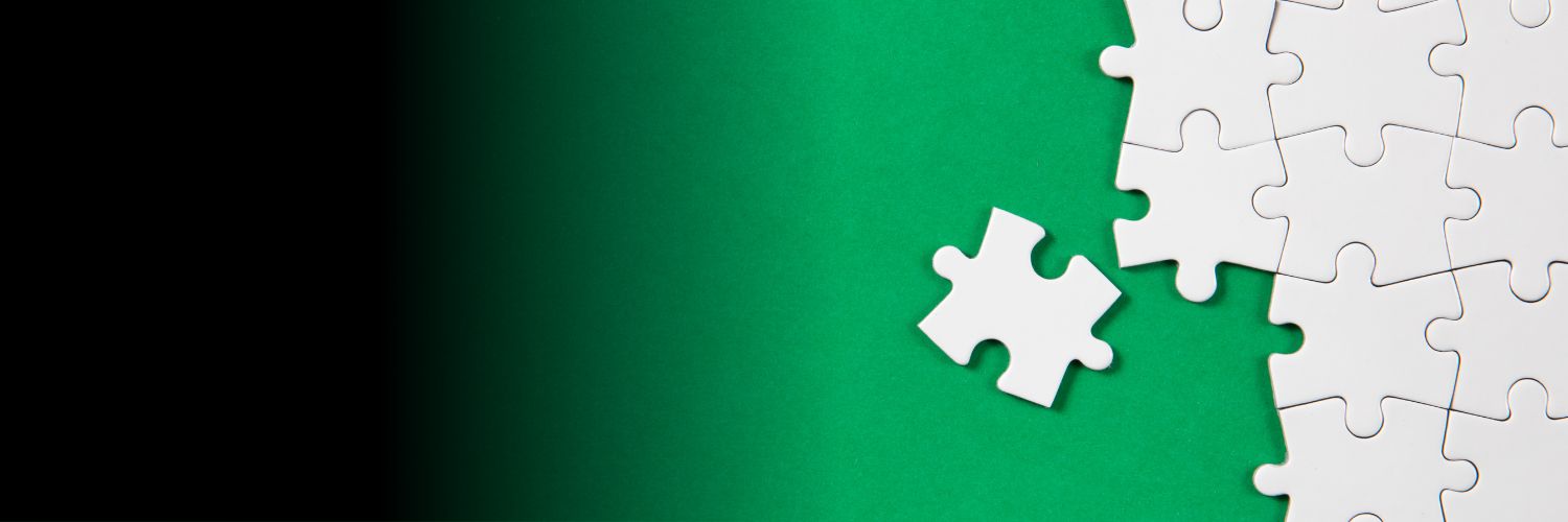 Green background with white puzzle pieces on the right edge.